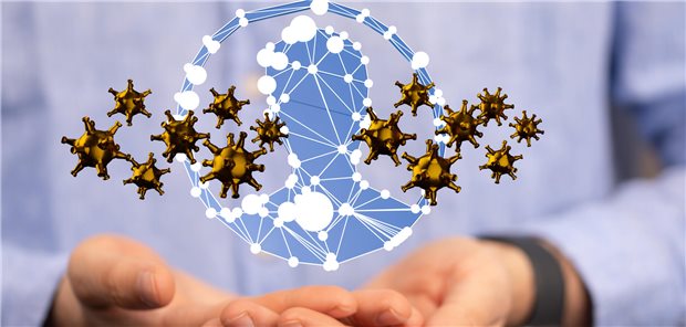 Viren vor dem Modell eines Gesichts