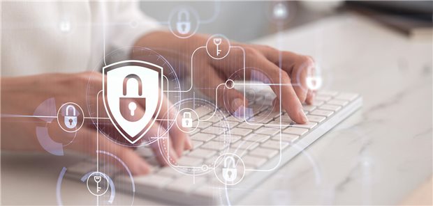 Arzt an Tastatur hinter digitalen Symbolen